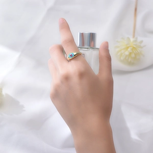 Bague en argent 925 doré avec zircon coeur rose et détails en émail bleu clair