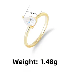 Close-up of 7mm pear-cut cubic zirconia on a gold band, 1.48g weight detail view