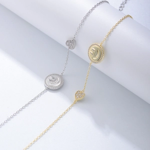 Bracelets élégants en argent avec charms sourire et cœur en zircon, finitions or et argent