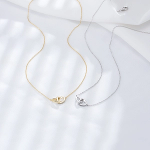 S925 sterling silver interlocking heart necklaces in gold and silver with zircon accents