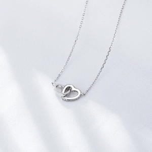 Elegant S925 sterling silver interlocking heart necklace with sparkling zircon crystals