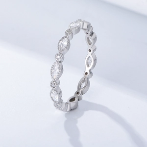 Macro side view of S925 silver ring featuring marquise cut zircons and milgrain edges