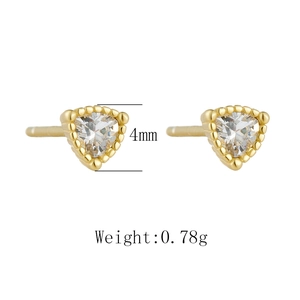 Macro detail of 4mm triangle stud earrings with clear zircon weighing 0.78g per pair