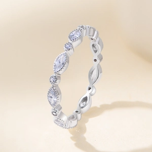 Elegant S925 silver ring with marquise and round stones featuring milgrain detailing