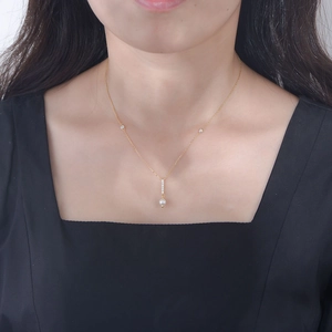 S925 silver pearl tassel necklace with geometric zircon pendant on a gold chain