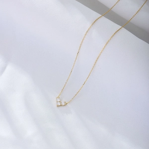 Elegant sterling silver heart necklace featuring three sparkling round-cut cubic zirconia