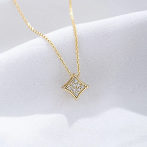 Minimalist gold necklace with a square geometric pendant pave-set with zircon crystals
