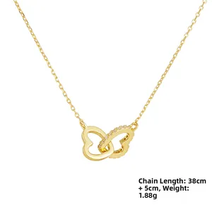 Detail of 925 silver interlocking heart necklace with gold finish and zircon pave