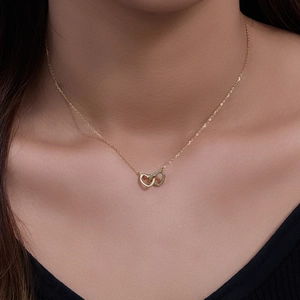 Elegant S925 sterling silver interlocking heart necklace with zircon pavé in gold finish