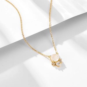 Elegant S925 silver necklace with a round moonstone pendant and sparkling zircon accents