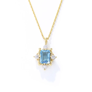 S925 silver necklace with sky blue topaz pendant and round zircons on gold chain