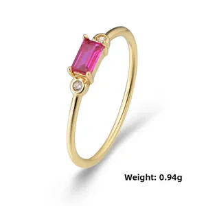 Macro shot of 0.94g gold-plated S925 silver ring with pink rectangle zircon and diamonds