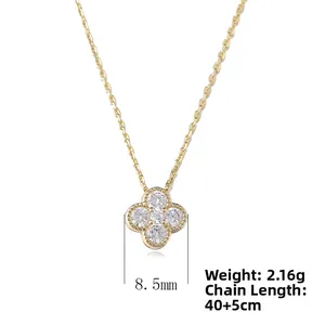 Close-up of 8.5mm clover pendant in gold finish with sparkling cubic zirconia stones