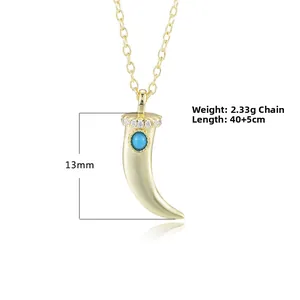 Detail of 13mm gold crescent pendant with turquoise, zircon accents and size markers