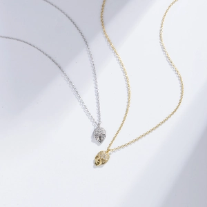 Punk style S925 silver skull pendant necklace with sparkling pavé stones in gold and silver