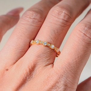Golden s925 silver geometric ring with pavé round cubic zirconia on finger
