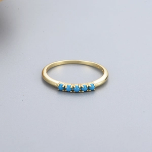 Minimalist gold plated S925 silver ring featuring five inlaid blue turquoise beads