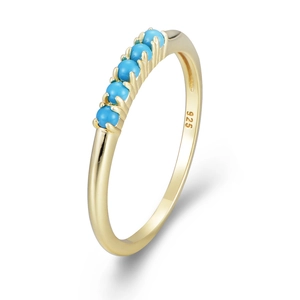 Minimalist S925 silver gold plated ring with five turquoise beads on a white background