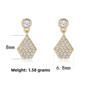 Macro detail of geometric S925 silver earrings with dimensions 8mm by 6.8mm