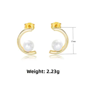 Detailed view of C-shaped pearl earrings showing S925 hallmark and 15mm size measurement