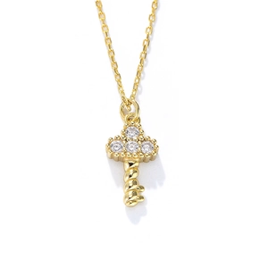 Elegant gold S925 sterling silver key necklace with four sparkling crystals on white background