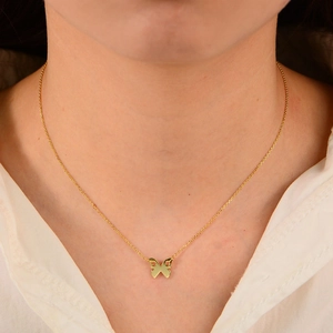 Minimalist s925 silver butterfly pendant necklace in gold finish on model neck