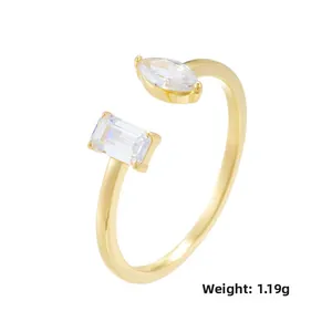 Detail view of a 1.19g gold-plated adjustable ring featuring marquise and baguette stones