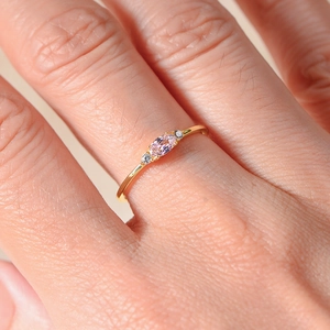 Marquise pink zircon ring in gold-plated sterling silver worn on a finger