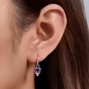 Elegant 925 silver gold-plated oval amethyst earrings with diamond accents on model