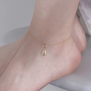 Elegant gold shell anklet with sparkling micro-pave crystals on a minimalist chain