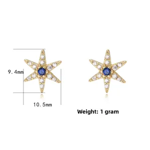 Detail of star-shaped silver studs with blue center stone and diamonds, 9.4mm x 10.5mm