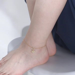 Golden shell pendant anklet with sparkling zircons on a delicate beaded chain for summer