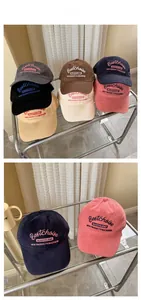 Close-up of premium cotton baseball caps with high-quality embroidery and natural lighting