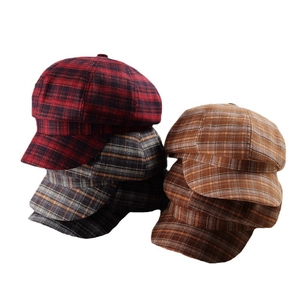 Retro vintage plaid newsboy caps in various colors with a classic octagonal design