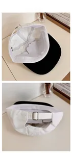 Detail of the adjustable metal buckle and interior branding on the two-tone baseball cap