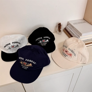 Flat brim baseball hats with Native Forest embroidery in assorted vintage colors