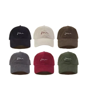 Set of six cotton baseball caps with 'me' embroidery in multiple colors on white background