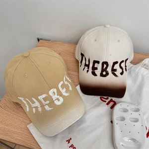 Vintage washed baseball cap with wide brim and THE BEST graffiti embroidery for unisex