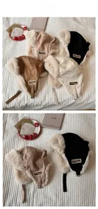 Detailed view of winter aviator hats with thick plush lining and adjustable chin straps