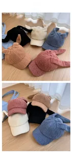 Detailed tile display of plush baseball caps with cute bunny ears in various colors