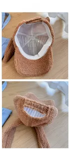 Detailed tile display of caramel fleece baseball cap with plush rabbit ears design