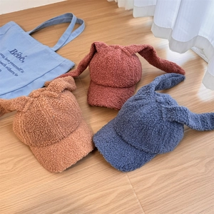 Cute lamb wool baseball caps with rabbit ears in brick red, caramel, and denim blue