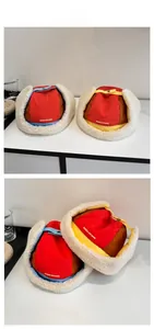Detail of color-block trapper hat featuring soft sherpa lining and ear protection