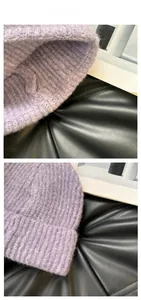 Detail of purple ribbed knit beanie showing soft mohair texture and thick weave pattern