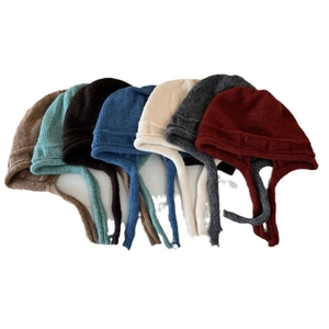 Women's knit beanie hat with ear flaps and straps in seven various solid colors
