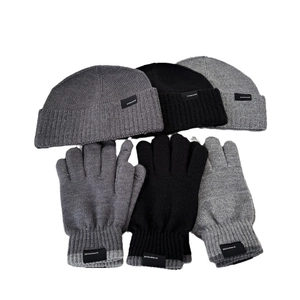 Winter knitted beanie and gloves set in grey and black with vertical ribbed texture