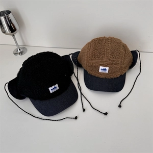 Winter fleece trapper hat with camo patchwork and ear flaps for warmth and style