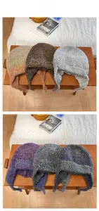 Detailed knit texture of wool blend ear-protection hats in six gradient colors for winter