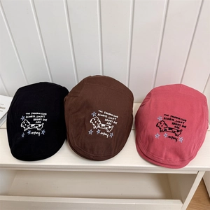 Three-color newsboy hats with dog embroidery in black, brown, and rose pink options
