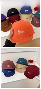 Detail display of five-panel quick-dry caps with triangle COOL patch in multiple colors